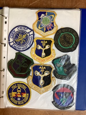 Lot 766 - Four albums of American Air Force military cloth badges to include rank insignia (4 albums)