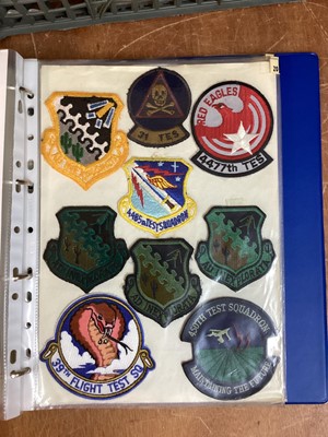 Lot 766 - Four albums of American Air Force military cloth badges to include rank insignia (4 albums)