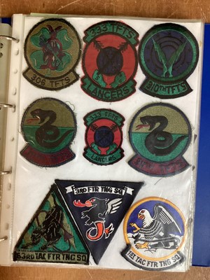 Lot 766 - Four albums of American Air Force military cloth badges to include rank insignia (4 albums)