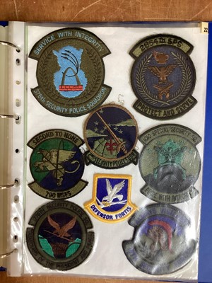 Lot 766 - Four albums of American Air Force military cloth badges to include rank insignia (4 albums)