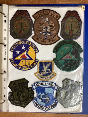 Lot 766 - Four albums of American Air Force military cloth badges to include rank insignia (4 albums)