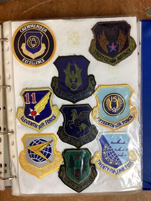 Lot 766 - Four albums of American Air Force military cloth badges to include rank insignia (4 albums)