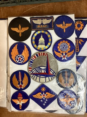 Lot 766 - Four albums of American Air Force military cloth badges to include rank insignia (4 albums)