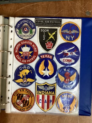 Lot 766 - Four albums of American Air Force military cloth badges to include rank insignia (4 albums)