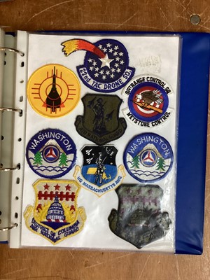 Lot 766 - Four albums of American Air Force military cloth badges to include rank insignia (4 albums)