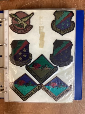 Lot 766 - Four albums of American Air Force military cloth badges to include rank insignia (4 albums)