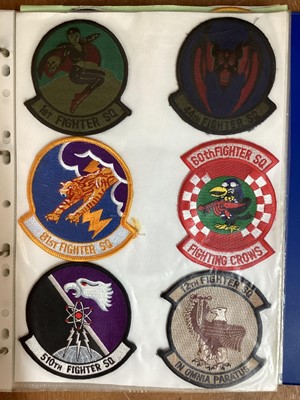 Lot 766 - Four albums of American Air Force military cloth badges to include rank insignia (4 albums)