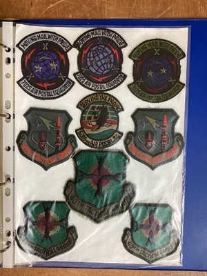 Lot 766 - Four albums of American Air Force military cloth badges to include rank insignia (4 albums)