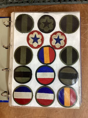 Lot 768 - Four albums of American US Army military cloth badges to include patches and rank insignia (4 albums)