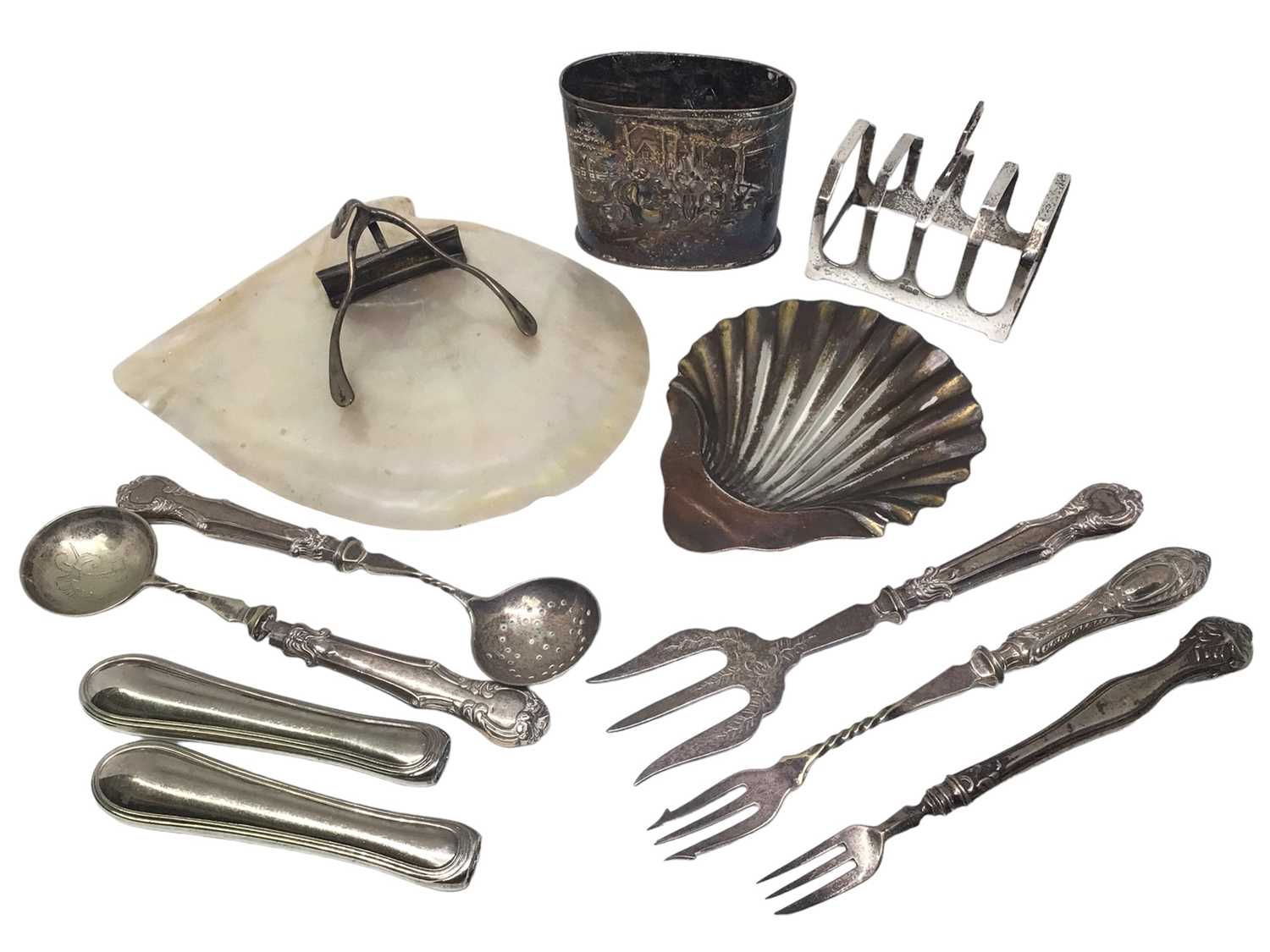 Lot 124 - Silver shell butter dish, silver toast rack,