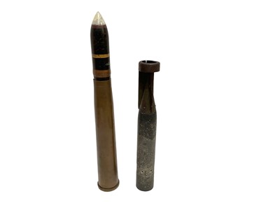 Lot 779 - Second World War German Incendiary bomb together with a brass naval shell (2)