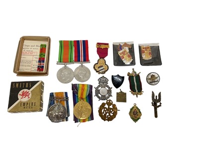 Lot 790 - First World War pair comprising War and Victory medals named to G-25198 PTE. W. Player. E. Kent. R. together with Second World War Defence and War medals and a small group of cap badges and other m...