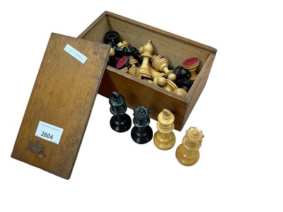 Lot 2604 - Antique turned boxwood and ebony chess set in pine box.