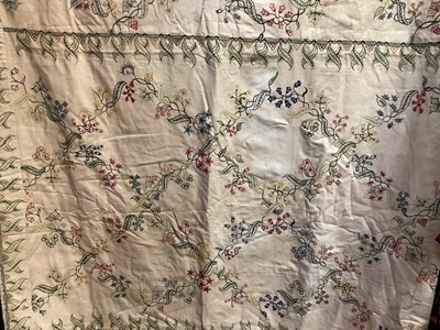 Lot 2143 - 1930s hand embroidered bed cover in scrolling flowers chain stitch, blue velvet hanging with hand embroidered cranes and bamboo. Crochet lace mats, lace pillow case plus some table linens.