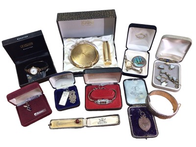 Lot 138 - Group of costume jewellery and bijouterie including 9ct gold cased Accurist wristwatch on plated bracelet, vintage paste set cocktail watch, silver ingot pendant on chain, silver bangle, Kingu comp...