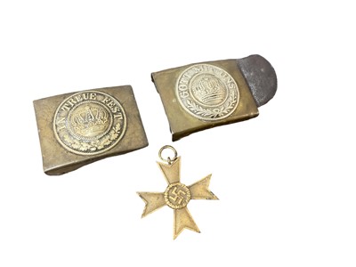 Lot 804 - Two First World War Imperial German Army belt buckles, together with a Nazi German War Merit Cross (no swords) (3).