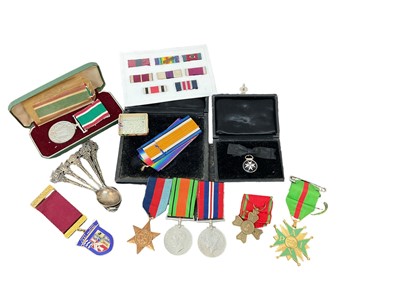 Lot 806 - Second World War medal trio comprising 1939 - 1945 Star, Defence and War medals (mounted on bar) together with Order of St John miniature medal, Women's Voluntary Service medal and others (1 box).