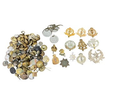 Lot 809 - Collection of assorted military buttons, pips, dog tags and other militaria.