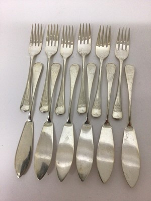 Lot 103 - Set of six silver Old English pattern fish knives and forks with engraved crests, all at 20ozs