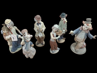 Lot 1282 - Six Lladro porcelain Clowns - Bohemian Melodies, For A Smile, Circus Sam, The magicians hat, Sad Sax and Pals Forever, all boxed