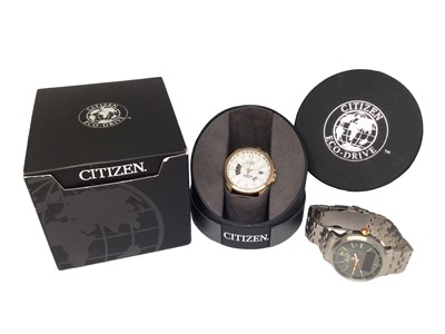 Lot 230 - Citizen Eco-Drive radio controlled perpetual calendar WR 100 wristwatch, boxed, and a Penguin stainless steel wristwatch (2)