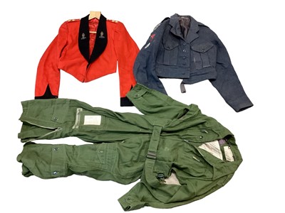 Lot 816 - Collection of assorted military uniforms to include a 1940 pattern battle dress blouse, 1960 RAF flying suit and other items (1 box).