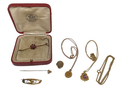 Lot 153 - Group of gold and yellow metal jewellery including two bar brooches, diamond stick pin, diamond set pendant on chain, 9ct gold gem set pendant on 9ct gold chain, one other chain and a collar stud