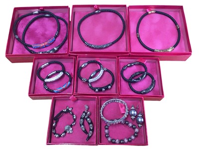 Lot 157 - Collection of Butler & Wilson diamanté and leather cord jewellery including four necklaces and six bracelets, together with other similar style jewellery, mostly boxed