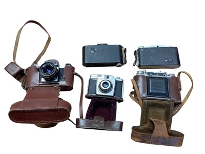 Lot 2359 - Three boxes of cameras and accessories, including Canon AE-1 x 2, Nikon EM, etc