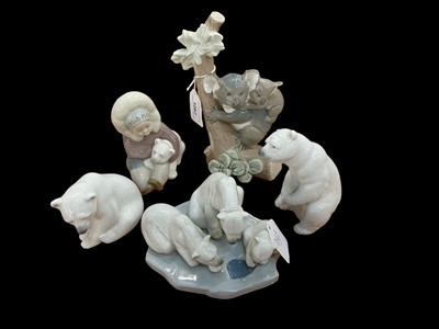 Lot 1287 - Lladro porcelain Koala figure group, together with three Lladro Polar Bears and an Eskimo (5)