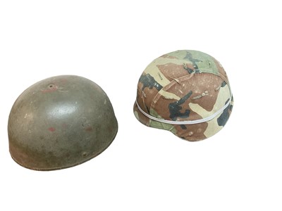 Lot 834 - 1950’s British Military Despatch Riders' helmet together with an American helmet with camouflage cover (2).