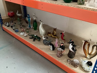 Lot 1290 - Large collection of coloured glassware including art glass animals and a selection of paperweights (1 shelf)