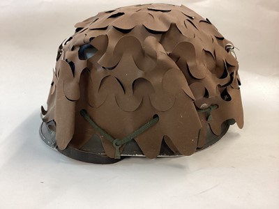 Lot 864 - Austrian M58 Type 2 steel helmet, US style, with US style plastic liner but with leather inner cradle.  Painted field grey.  With original scrim camouflage cover