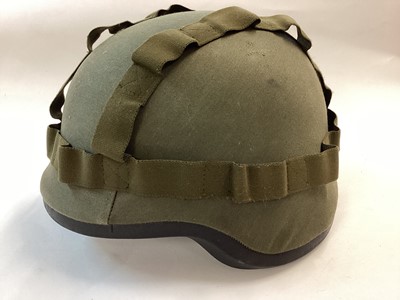 Lot 867 - Austrian M92 composite military helmet comprising French CGF Gallet TC-3 body and MSA Gallet liner, dated 1997. Painted rough texture green and complete with cover and rubber trimming. Size 52-58