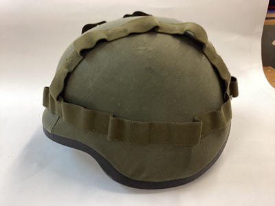 Lot 867 - Austrian M92 composite military helmet comprising French CGF Gallet TC-3 body and MSA Gallet liner, dated 1997. Painted rough texture green and complete with cover and rubber trimming. Size 52-58