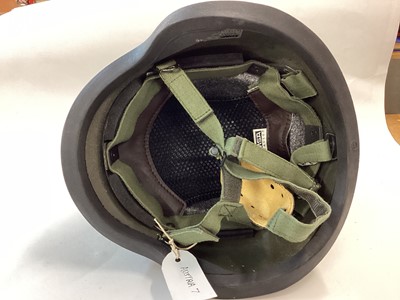 Lot 867 - Austrian M92 composite military helmet comprising French CGF Gallet TC-3 body and MSA Gallet liner, dated 1997. Painted rough texture green and complete with cover and rubber trimming. Size 52-58