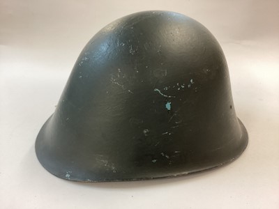 Lot 871 - Romanian M1974 steel helmet, Warsaw Pact era.  Complete with liner, neck flap and four point harness.  Excellent condition.  Obtained from Bucarest 2003