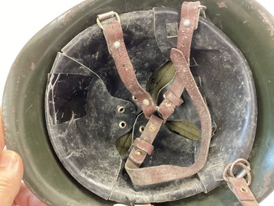 Lot 871 - Romanian M1974 steel helmet, Warsaw Pact era.  Complete with liner, neck flap and four point harness.  Excellent condition.  Obtained from Bucarest 2003