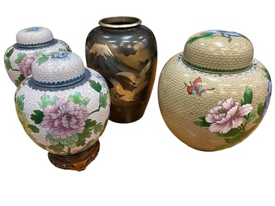 Lot 2555 - Japanese bronze and mixed metal vase and three cloisonne jars and covers