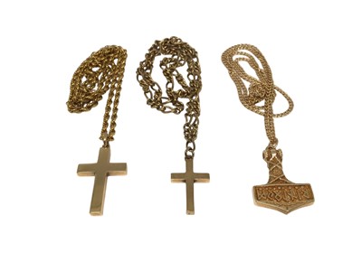 Lot 177 - Two 9ct gold cross pendants both on 9ct gold chains, together with a 14ct gold pendant on 14ct gold chain