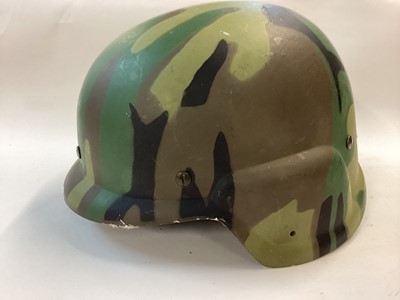 Lot 881 - Rare prototype US PASGT helmet in camouflage paint finish, made of GRP by consolidated Moulded Products 1976, complete with cradle