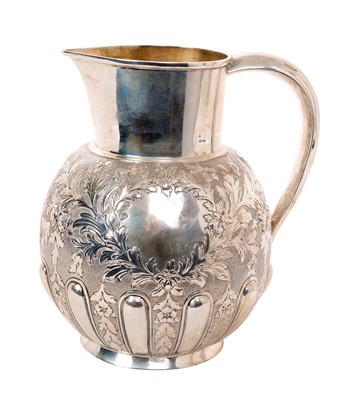 Lot 309 - Late Victorian silver water jug with repoussé decoration