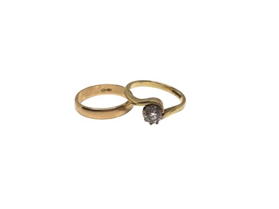 Lot 282 - Diamond single stone ring with a brilliant cut diamond estimated to weigh approximately 0.40cts in 18ct gold crossover setting together with an 18ct gold wedding ring