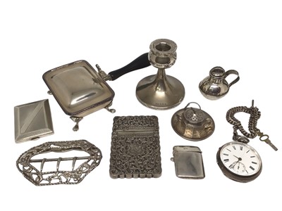 Lot 270 - Group of silver items to include an Irish silver Silent Butler with wooden handle (Dublin 1944), a novelty silver 'teapot' tea infuser on stand, late 19th century Indian silver/white metal visiting...