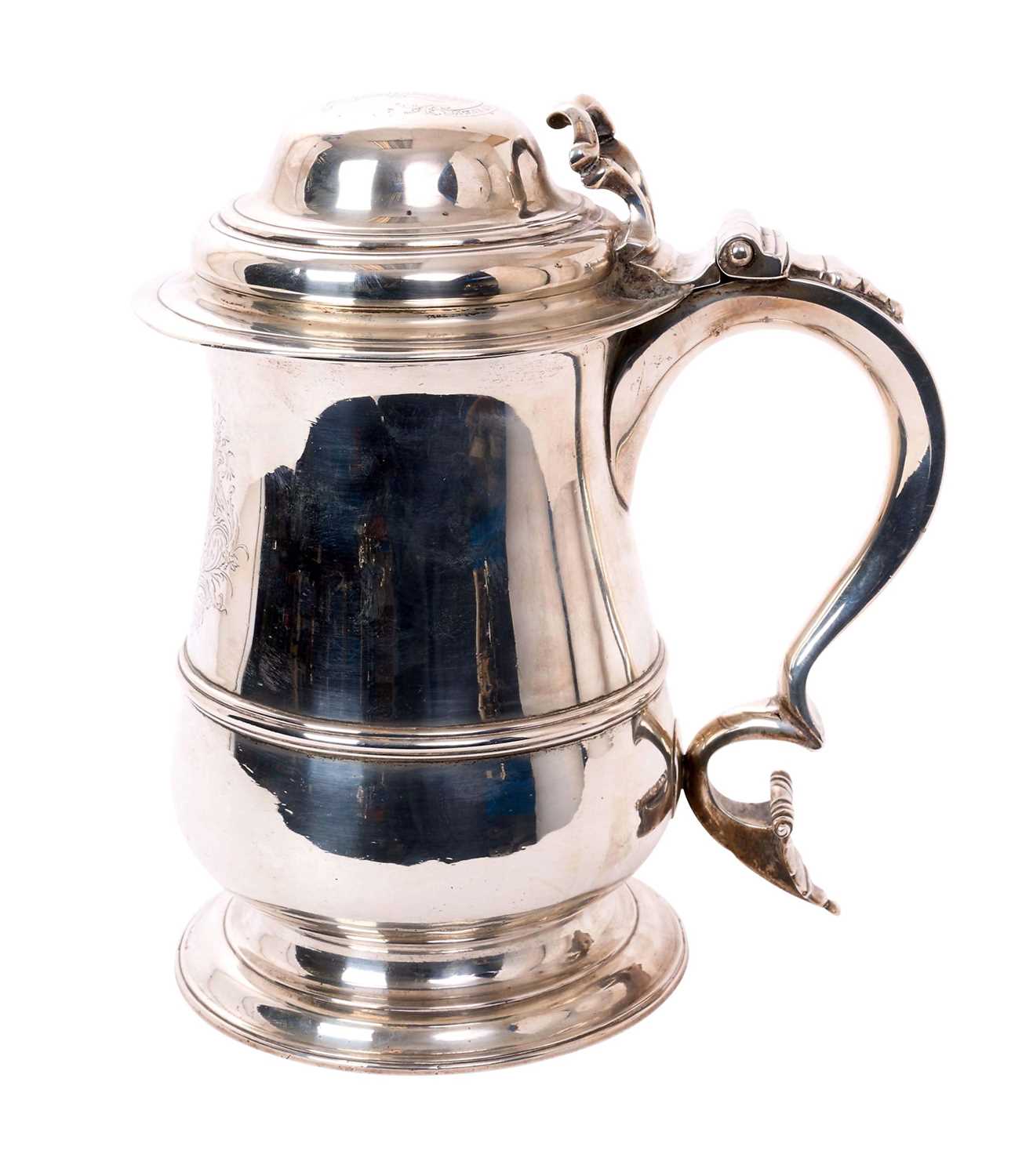 Lot 388 - Large George II lidded silver tankard