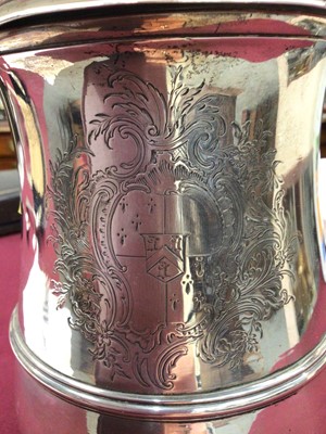 Lot 388 - Large George II lidded silver tankard