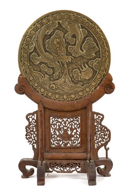 Lot 805 - Chinese circular bronze plaque on stand