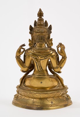 Lot 803 - Indo-Chinese gilt bronze deity figure