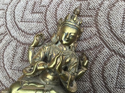 Lot 803 - Indo-Chinese gilt bronze deity figure