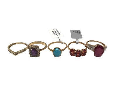 Lot 300 - Five 9ct yellow gold and gem-set dress rings (5)